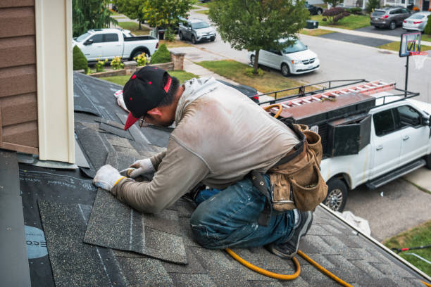 Professional Roofing technician working in Stockton, MD